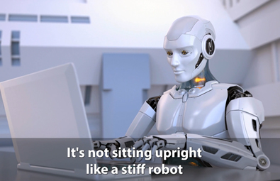 a robot sitting stiff and upright, working on a laptop
