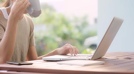 woman searching on a laptop